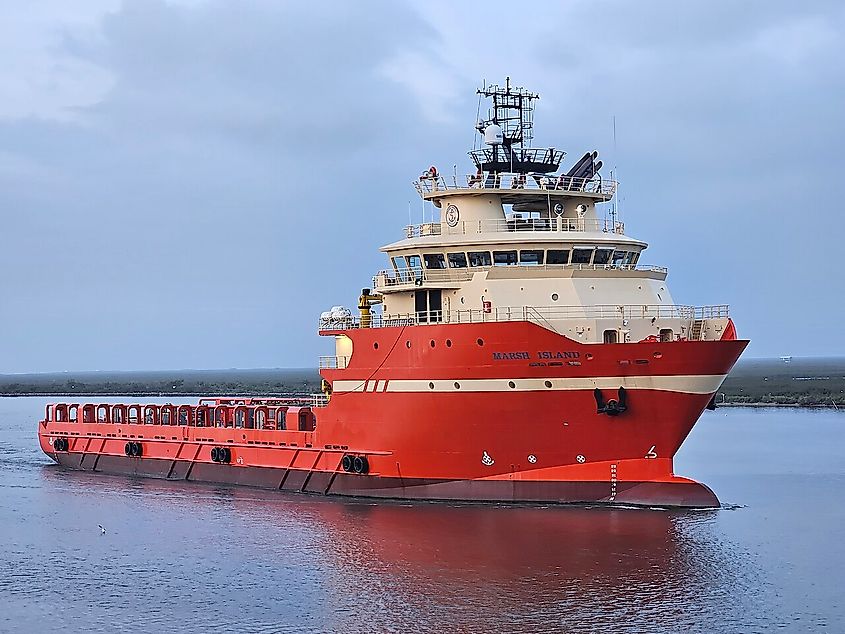 Offshore supply vessel Marsh Island underway on Bayou Lafourche in Port Fourchon, Louisiana. Vessel owned by Edison Chouest Offshore.