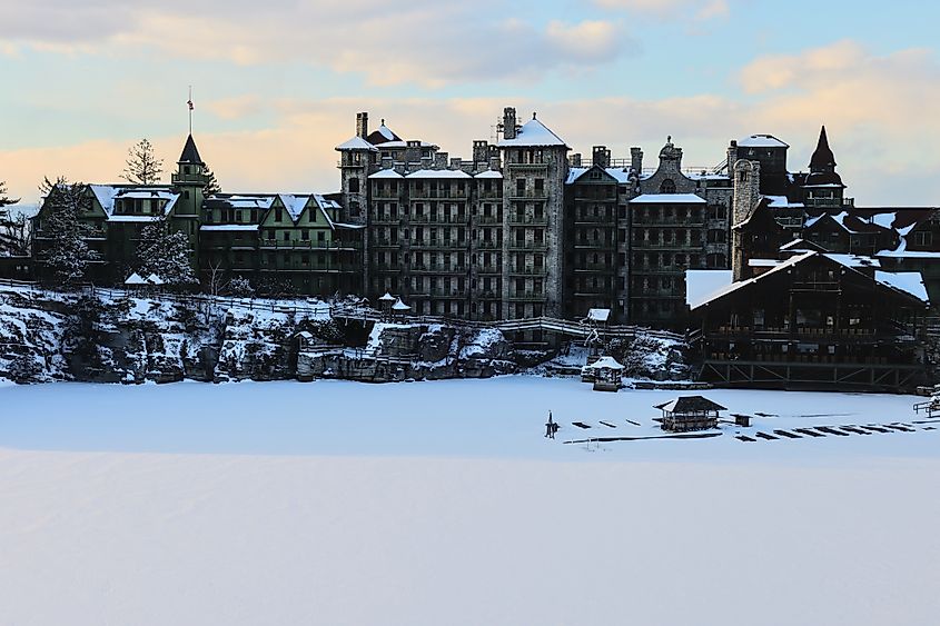 View of historic Mohonk Mountain House in New Paltz, New York in winter.