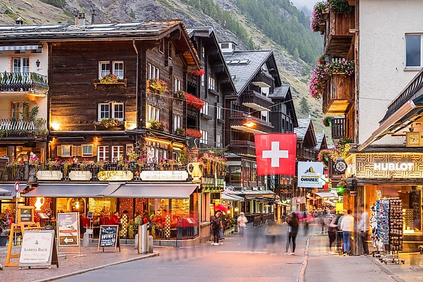 The historic Bahnhofstrasse at dusk in Zermatt, Switzerland