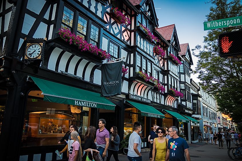 Shoppers and pedestrians near Tudor-style building on Witherspoon Street in Princeton, New Jersey