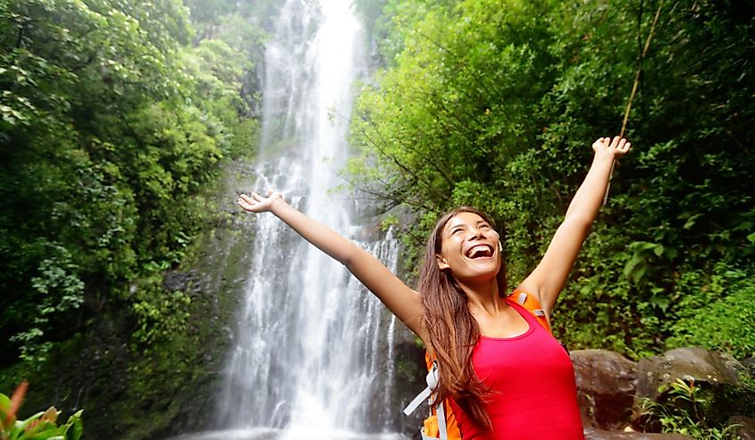 Tourist on the famous road to Hana on Maui, Hawaii.