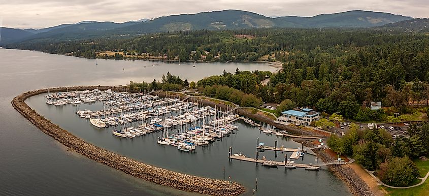 Aerial view of John Wayne Marina in Sequim, Washington. The marina sits on land donated by the actor’s family, honoring his vision for a scenic marina in Sequim Bay.