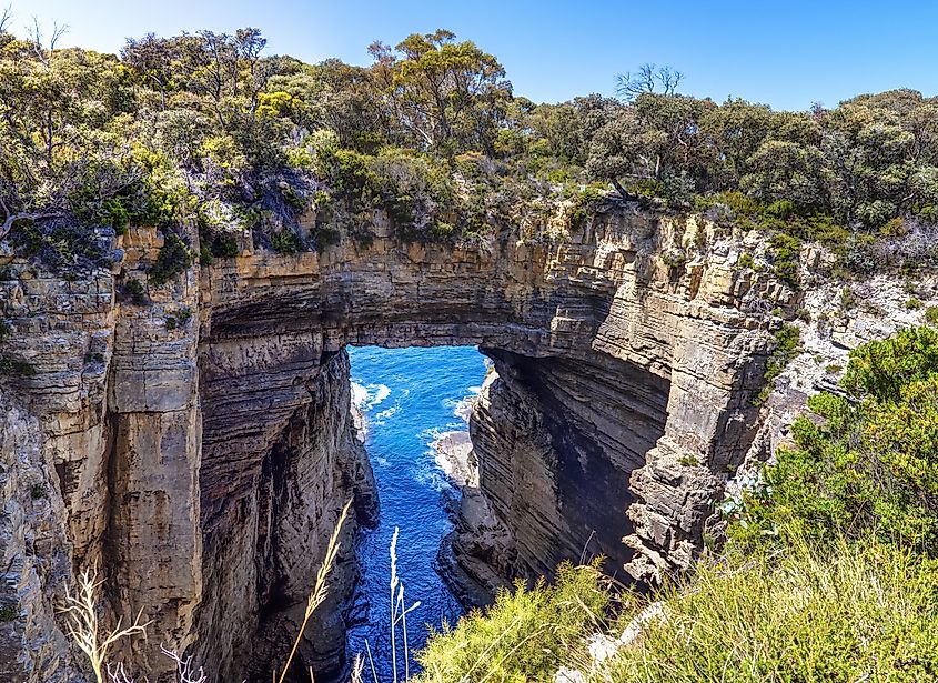 A panorama of the Tasmans Arch, a natural rock bridge over the sea at Eaglehawk Neck, Tasmania