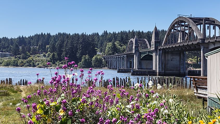 Siuslaw River Bridge and river view in historic Old Town Florence, Oregon, USA.