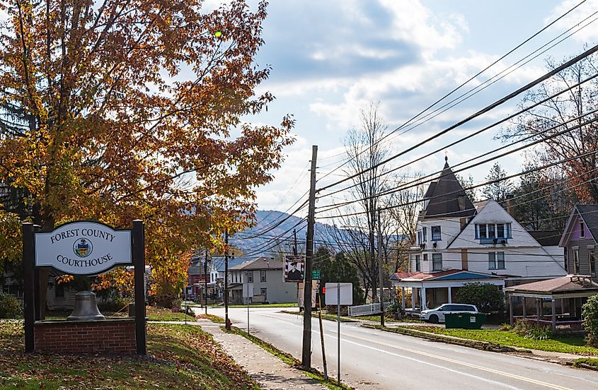 Tionesta, Pennsylvania: The Forest County Courthouse sign on Elm Street on a sunny fall day.