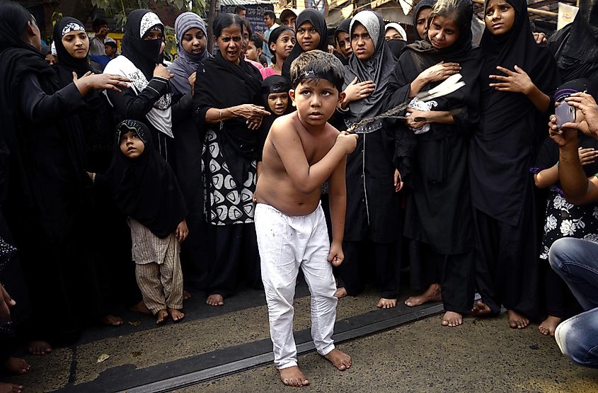Shia Muslims take part in a Muharram mourning procession