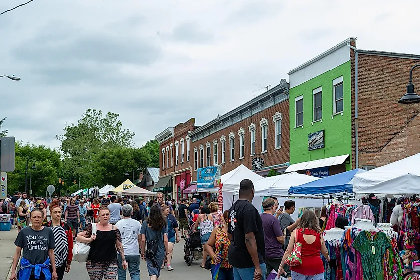 People shopping and browsing at a public street festival in Yellow Springs