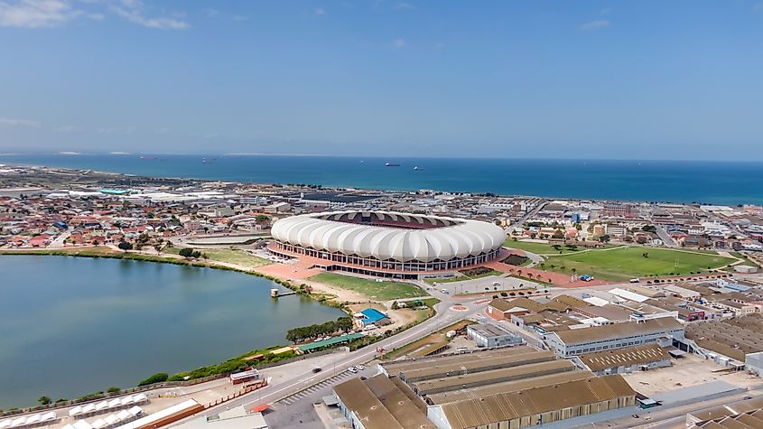 Aerial panorama of stadium in Mandela Bay with North End Lake and Indian Ocean