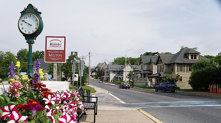 View of the town of Milton, Delaware, on a summer day, showing local traffic and the quaint surroundings.