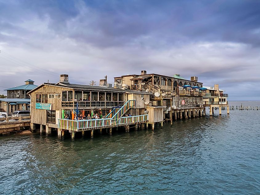 Waterfront buildings on stilts in Cedar Key, Florida.