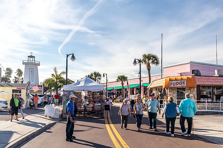 People walking around in the historical downtown of Tarpon Springs, Florida.