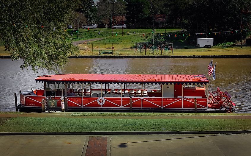 A boat on the Cane River below the town strip. Editorial credit: Sabrina Janelle Gordon / Shutterstock.com