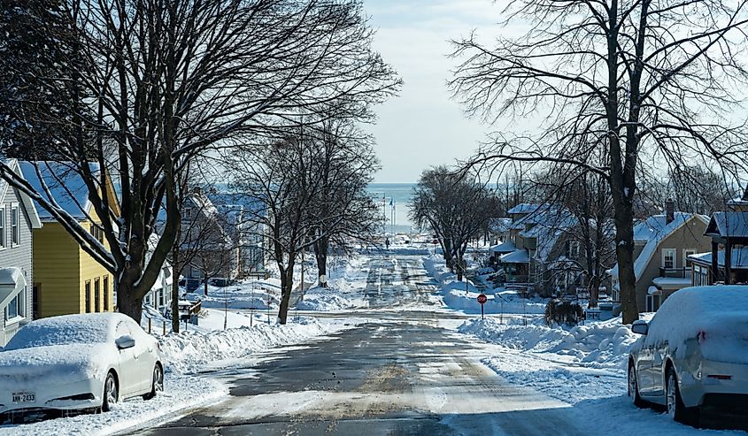 Residential area with snow covered streets in a neighborhood on Lake Michigan, Sheboygan, Wisconsin