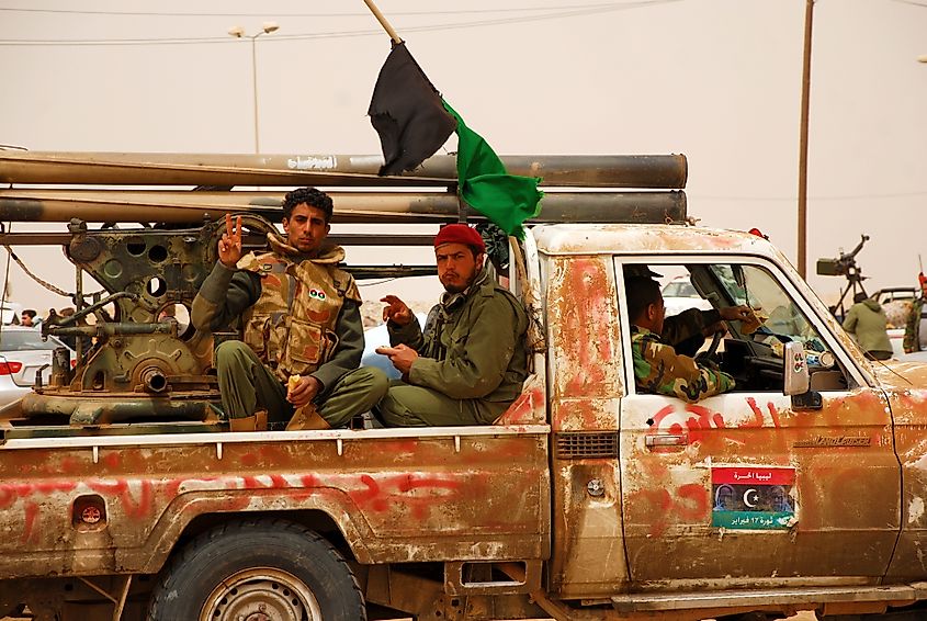 Libyan rebels preparing to fight the forces of Muammar Gaddafi.  April 7, 2011. Credit Shutterstock: Rosen Ivanov Iliev.