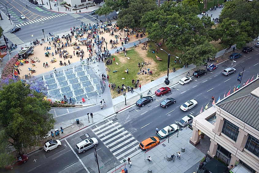 Cyclists gather for San Jose Bike Party in Plaza de Cesar Chavez Park, via Matthew Corley / Shutterstock.com