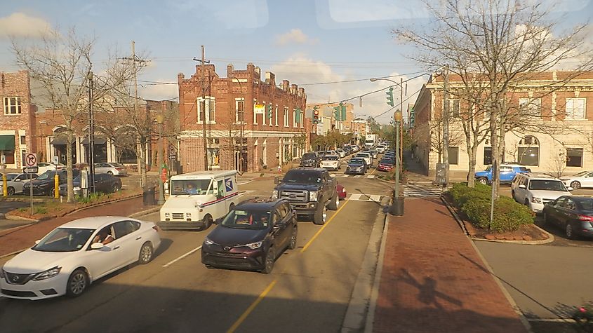 A street scene in Hammond, Louisiana, featuring local shops, historic architecture, and a lively small-town atmosphere.