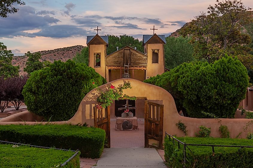 Historic El Santuario de Chimayo in Chimayo, New Mexico at sunset.