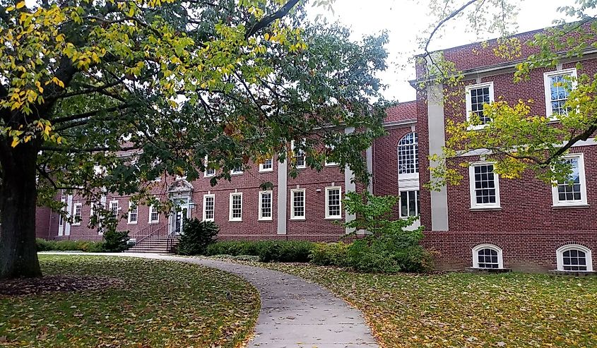 Old brick building at campus of Pennsylvania State University on a cloudy day State College, Pennsylvania.