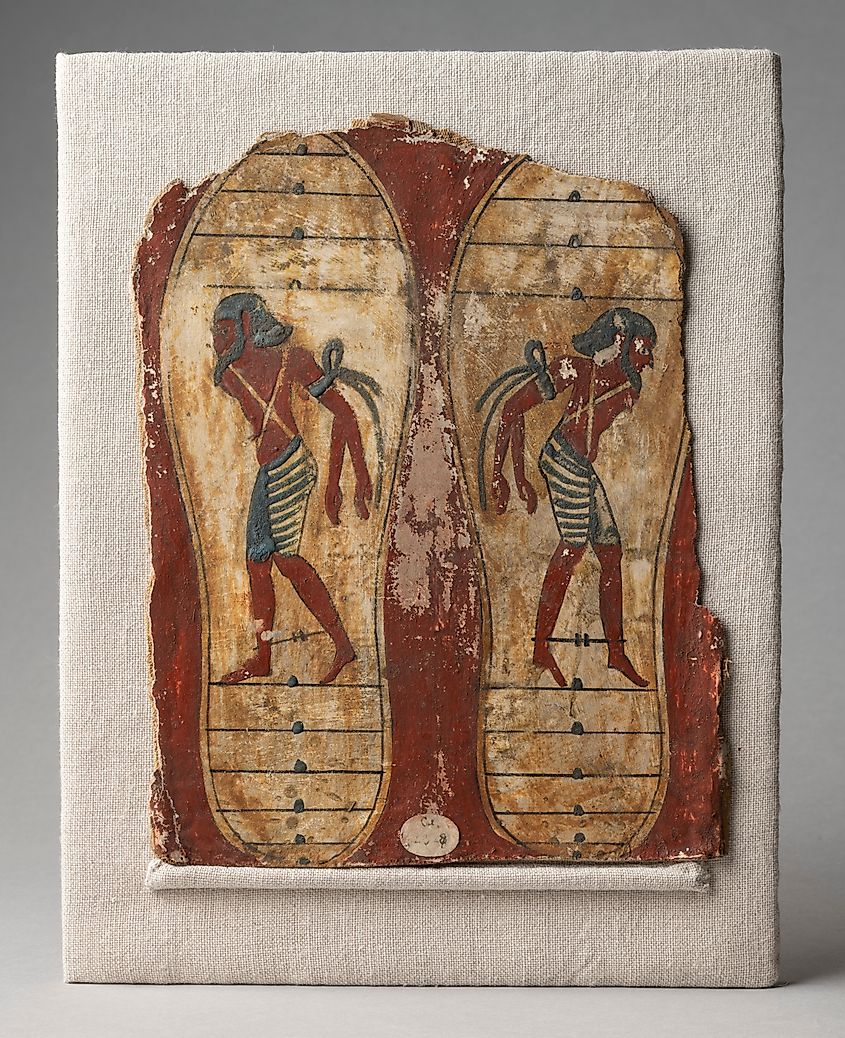 Shoe soles from an Egyptian mummy showing enslaved prisoners of war