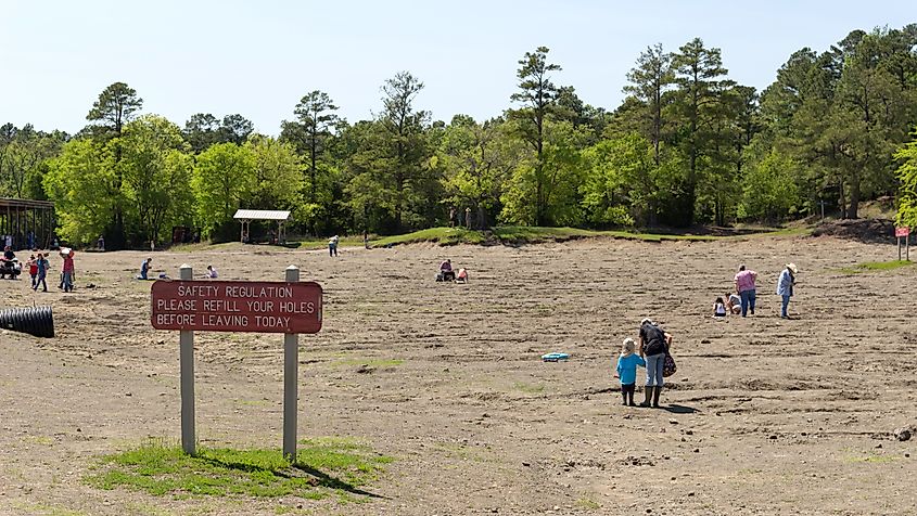 People look for diamonds in the field at Crater of Diamonds State Park in Murfreesboro, Arkansas.