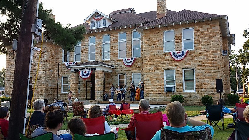 People enjoying a musical performance in Mountain View, Arkansas