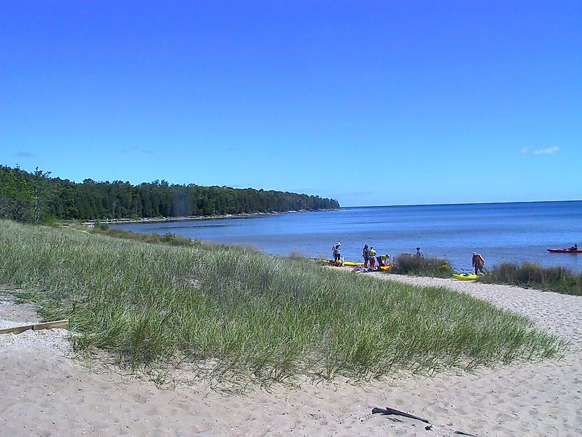 Kayakers on the beach at Newport State Park.