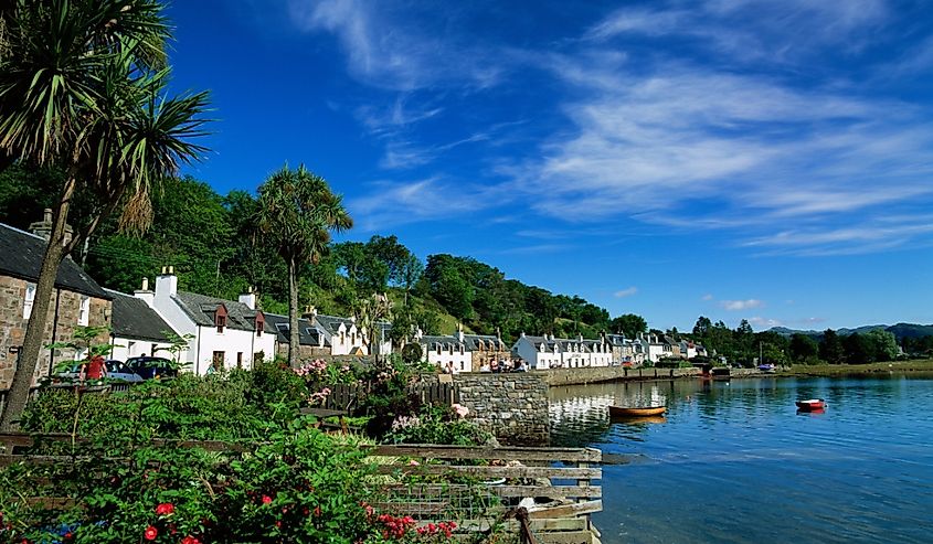 View of Plockton Harbor on a sunny day in Scotland.