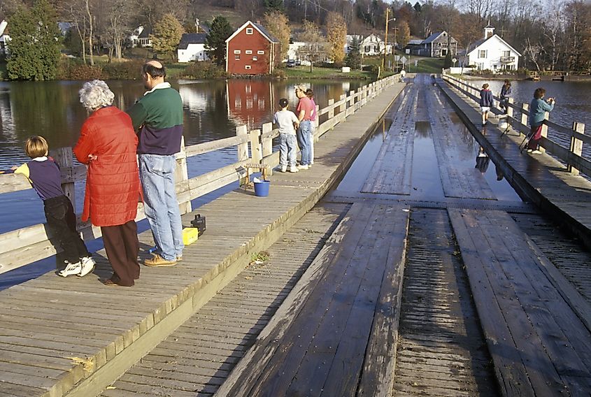 People walking on the Brookfield Floating Bridge in Brookfield, Vermont