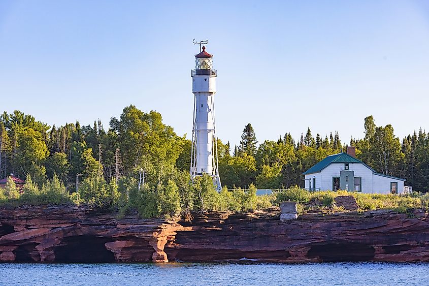 The sea caves of the Apostle Islands, home to a charming lighthouse, are located in Bayfield, Wisconsin.