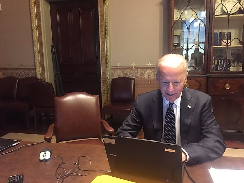 President Joe Biden using a laptop. Image via Public Domain.