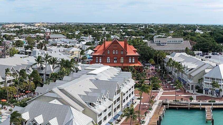 Aerial view of Old Town Key West, Florida, highlighting the Old Post Office and Customshouse, now the Key West Museum of Art and History, along with the nearby port, Opal Key Resort, and Marina.