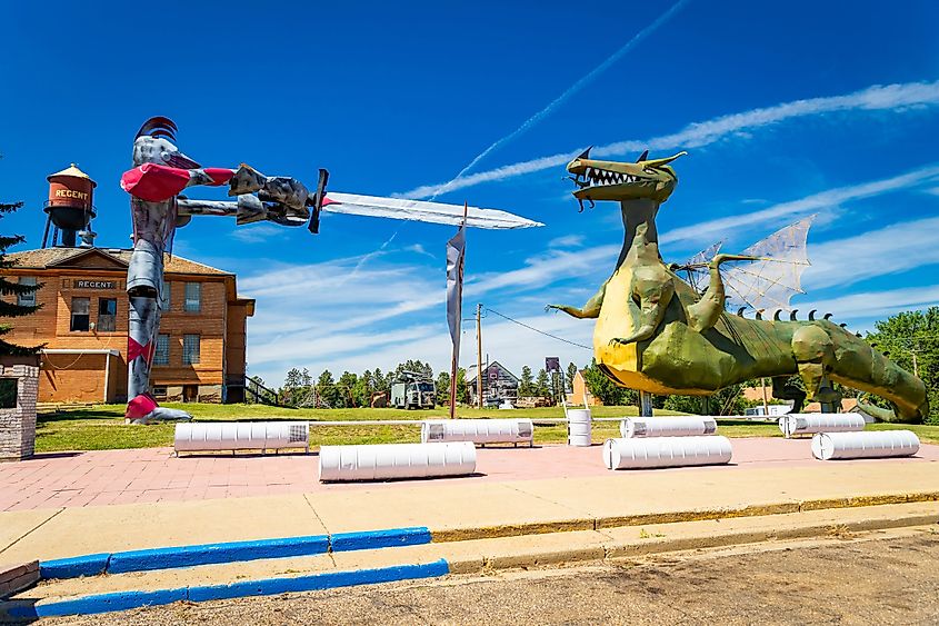 Regent, ND, USA - July 13, 2025: The Enchanted Castle Hotel in Regent, North Dakota, features a grand Knight and Dragon sculpture