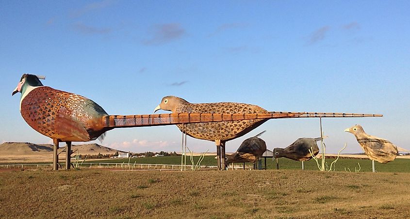  Regent, North Dakota, USA: A metal sculpture titled "Pheasants on the Prairie" along the Enchanted Highway in west North Dakota, part of a series of oversized folk art sculptures that make this scenic route truly enchanting.
