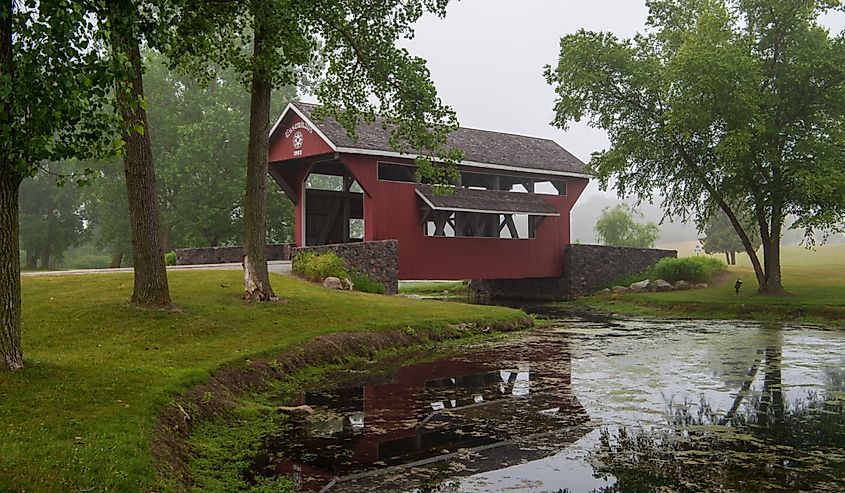 Essenhaus, a multi kingpost truss bridge, was built in 1993 on a service road of the Dutchman Essenhaus campus in Middlebury, Indiana