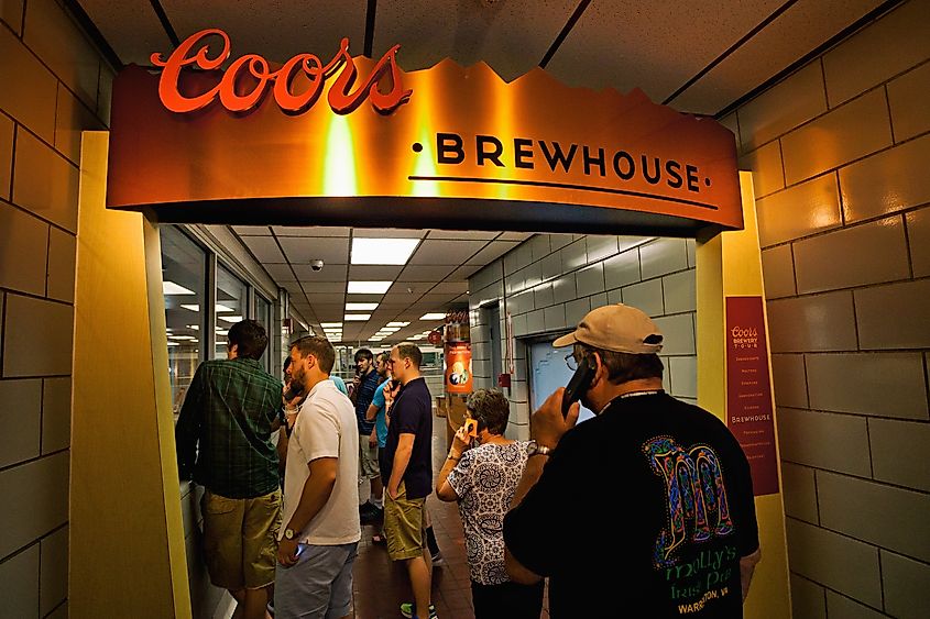 Editorial Photo Credit: Infinite_Eye via Shutterstock. GOLDEN, CO - August 3rd, 2016 - The famous Coors Brewery and History Tour in Golden, Colorado. Founded in 1873 it is now the largest single brewery facility in the world.