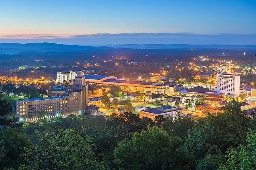 Aerial view of Hot Springs, Arkansas, showcasing the town's skyline at dawn.