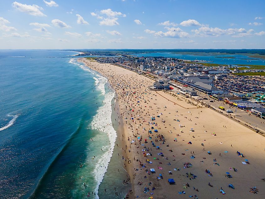 Hampton Beach aerial view including historic waterfront buildings on Ocean Boulevard and Hampton Beach State Park.