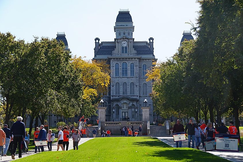 Syracuse, New York - The college students and visitors walking around campus in the Fall near the Hall of Languages.