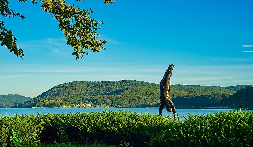 A bronze statue of a diver in this city’s scenic Riverfront Green Park appears to be taking a dive into the Hudson from the angle of view.