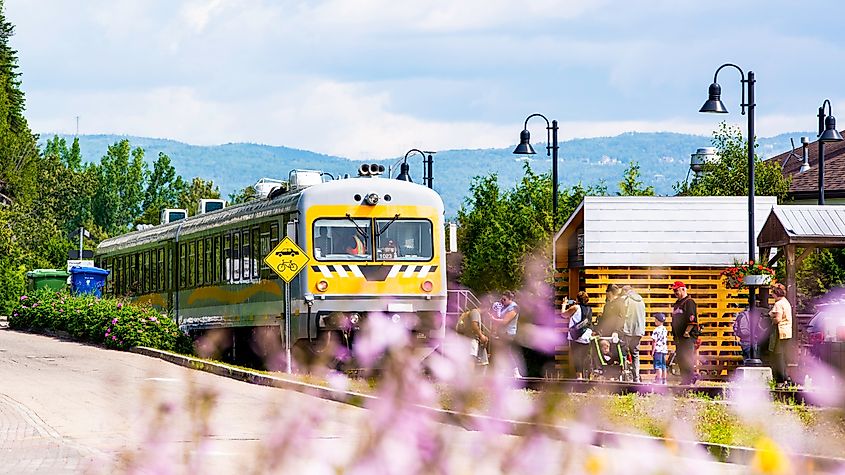 Charlevoix train arriving at station in a sunny day in La Malbaie. Editorial credit: Vincent JIANG / Shutterstock.com