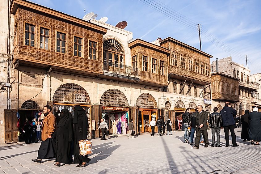 People walk in Aleppo, Syria