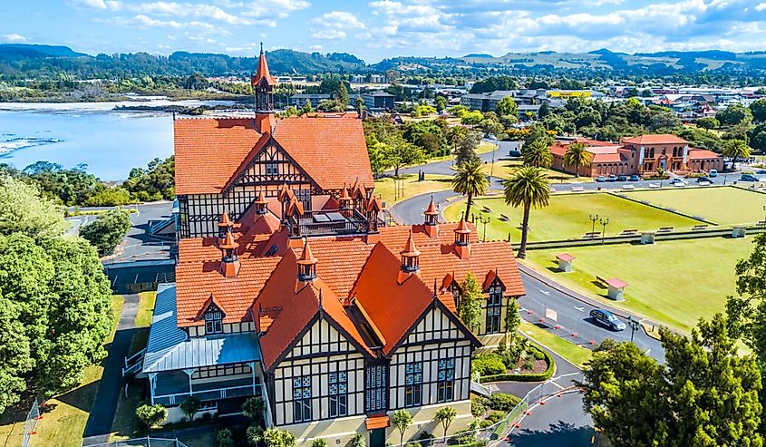 Aerial view on Rotorua Museum with lake and hill on the background. Rotorua, New Zealand.
