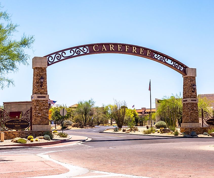 Welcome to Carefree, Arizona, featuring the Desert Gardens and the iconic Sundial amidst the scenic desert landscape.