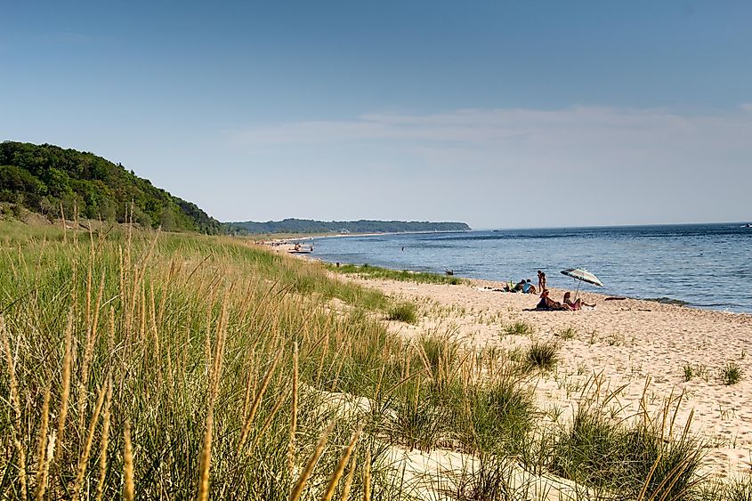 People relaxing on the beach in Saugatuck, Michigan.