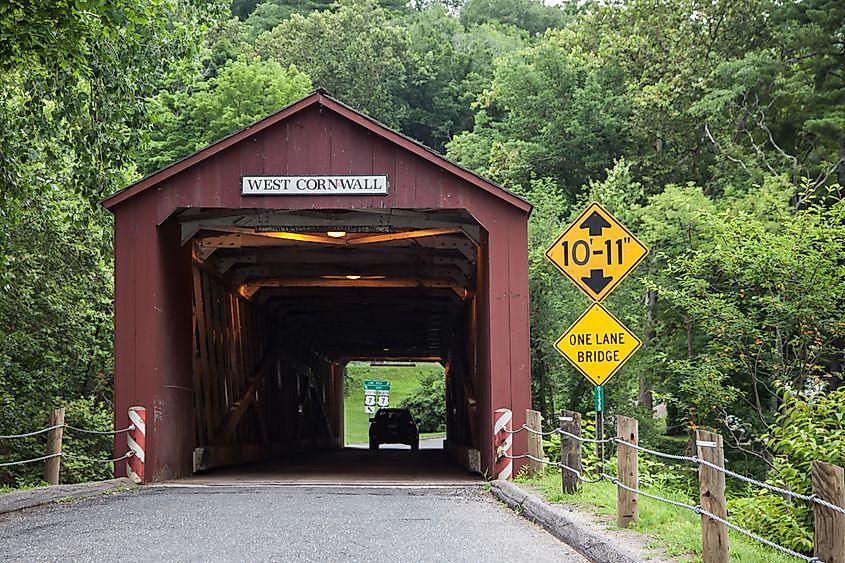 The 1864 West Cornwall Covered Bridge, also known as Hart Bridge, a wooden lattice truss bridge spanning the Housatonic River in West Cornwall, CT, USA