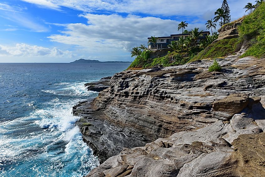 Editorial Photo Credit: Jordan Tan via Shutterstock. Spitting Cave of Portlock in Oahu, Hawaii