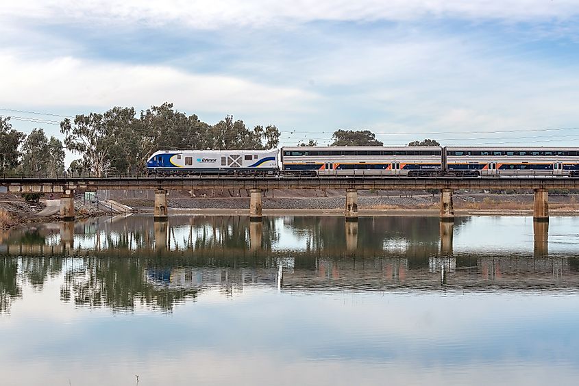 An Amtrak train crossing a bridge.