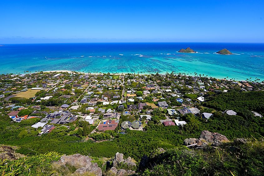 Oceanfront neighborhood of Lanikai Beach in Kailua, as seen from the Lanikai Pillbox hike on the eastern side of Oahu, Hawaii.