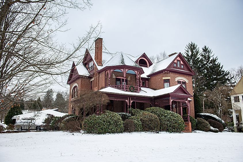 Wellsboro, Pennsylvania - January 6, 2025: Historical victorian style home brick and pink trim