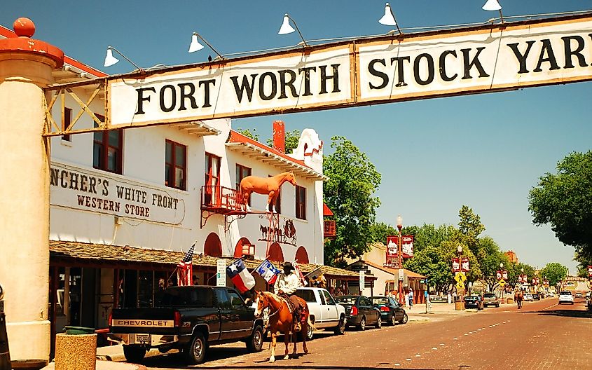 A sheriff patrols the streets of the Fort Worth Stockyards while riding on a horse